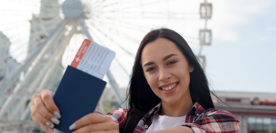 Australia Study Visa consultant in Patiala assisting students with passport and boarding pass after Australia study visa approval